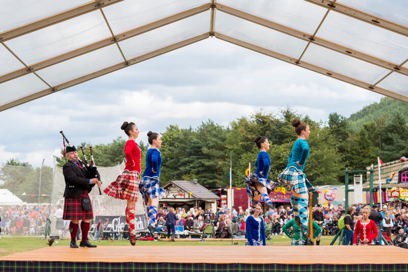 Highland dancers perform traditional Scottish dance at The Ballater Highland Games
